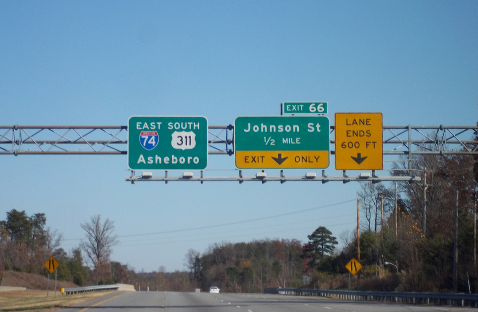 Photo of updated signage at the Johnson Street Exit on I-74 East near High 
Point, Nov. 2010, Courtesy of Adam Prince