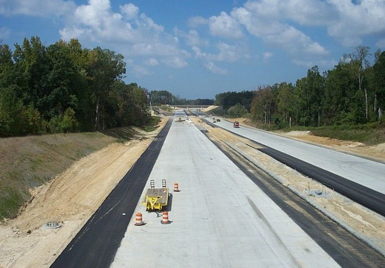 Photo of view westbound from High Point Road Bridge of Greensboro Urban Loop 
under construction, Sept. 2007