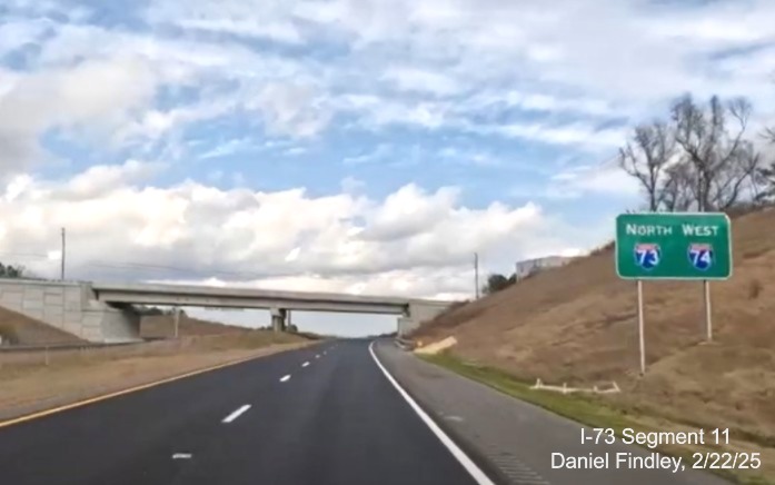 Screen grab image of North I-73 West I-74 reassurance marker sign after Business
74 East on-ramp, Daniel Findley, February 2025
