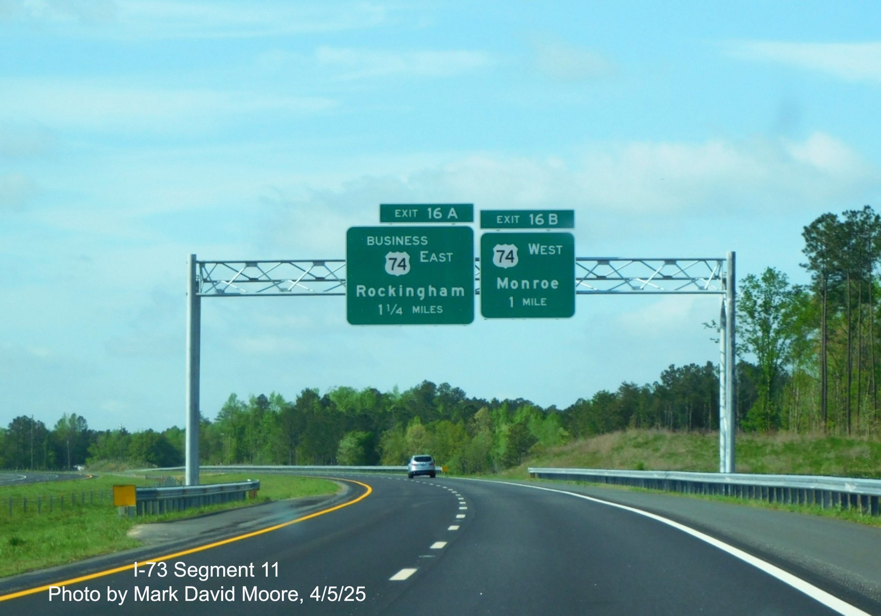 Image of 1 1/4 and 1 mile advance signs for Business 74 and US 74 exits on
I-73 South/I-74 East Rockingham Bypass by Mark David Moore, April 2025