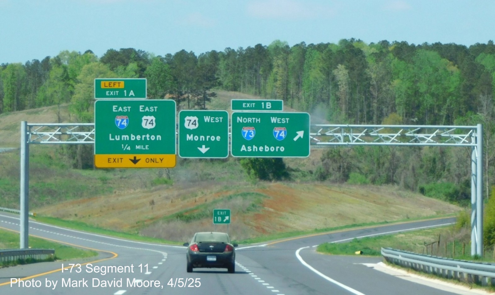 Image of overhead advance signs for I-73/I-74 and I-74/US 74 Rockingham Bypasses
on US 74 Business West by Mark David Moore, April 2025