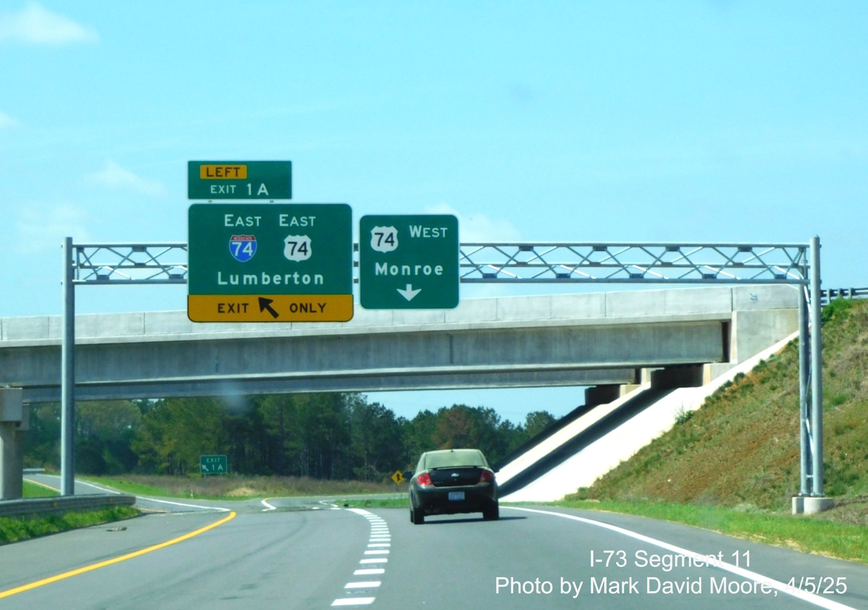 Image of overhead ramp sign for the I-74/US 74 East Rockingham Bypass
on US 74 Business West by Mark David Moore, April 2025