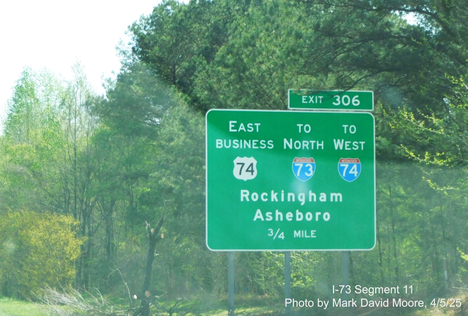 Image of ground mounted 3/4 Mile sign for the Business 74 to I-73/I74
Rockingham Bypass on US 74 East by Mark David Moore, April 2025