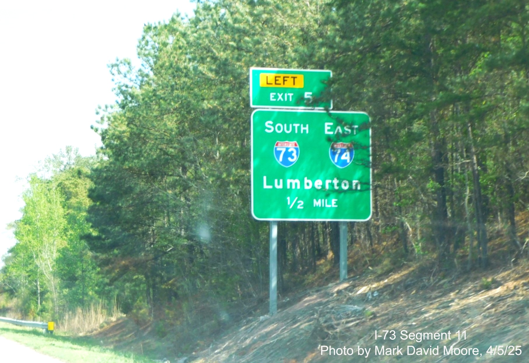 Image of ground mounted 1/2 mile advance sign for the I-73/I-74 Rockingham
Bypass on US 220 North by Mark David Moore, April 2025