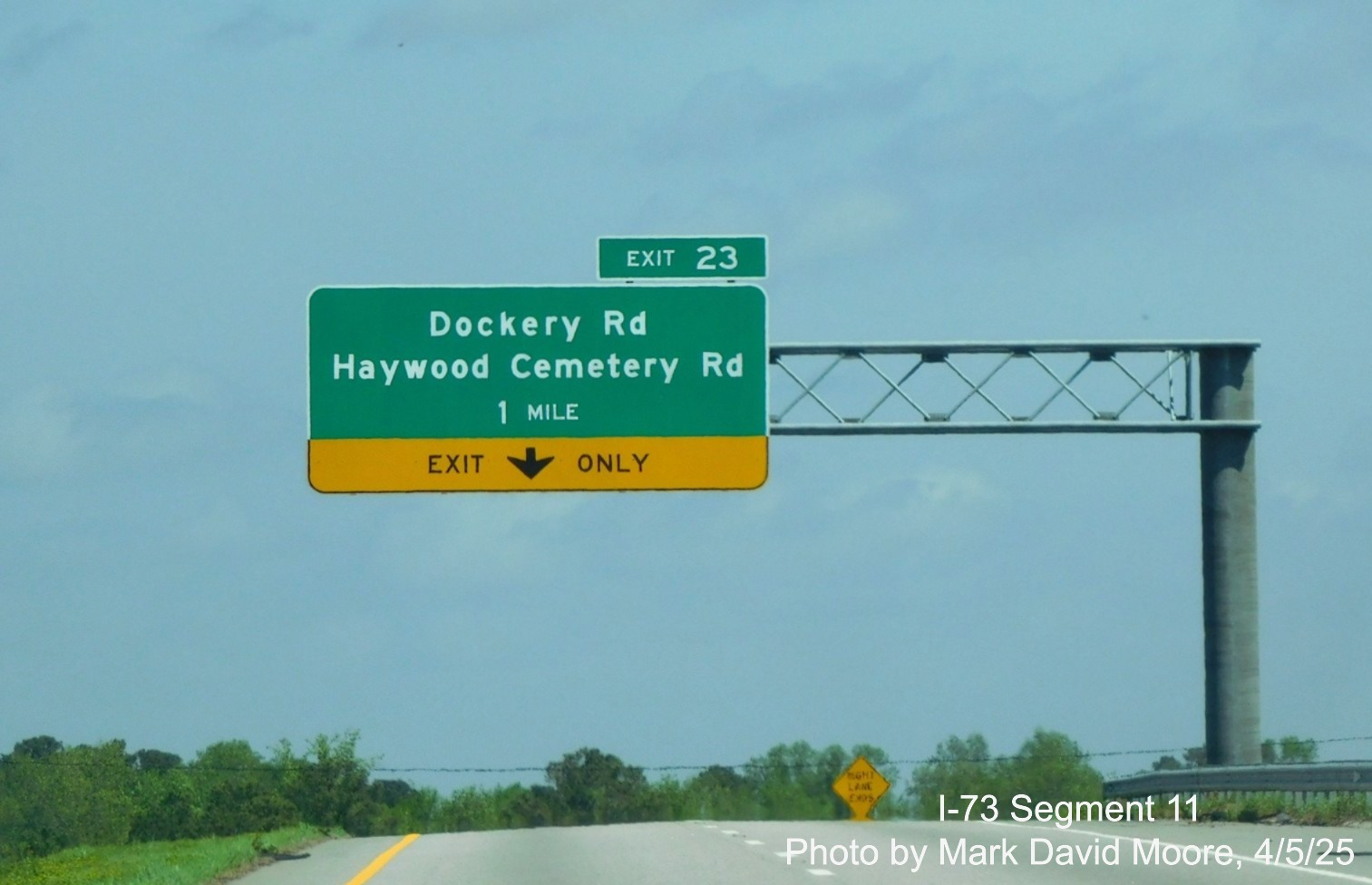 Image of overhead 1 mile advance sign for Dockery Road/Haywood Cemetery Road
on US 220 North prior to its merge with I-73 North/I-74 West at the end of the Rockingham Bypass by Mark David Moore,
April 2025