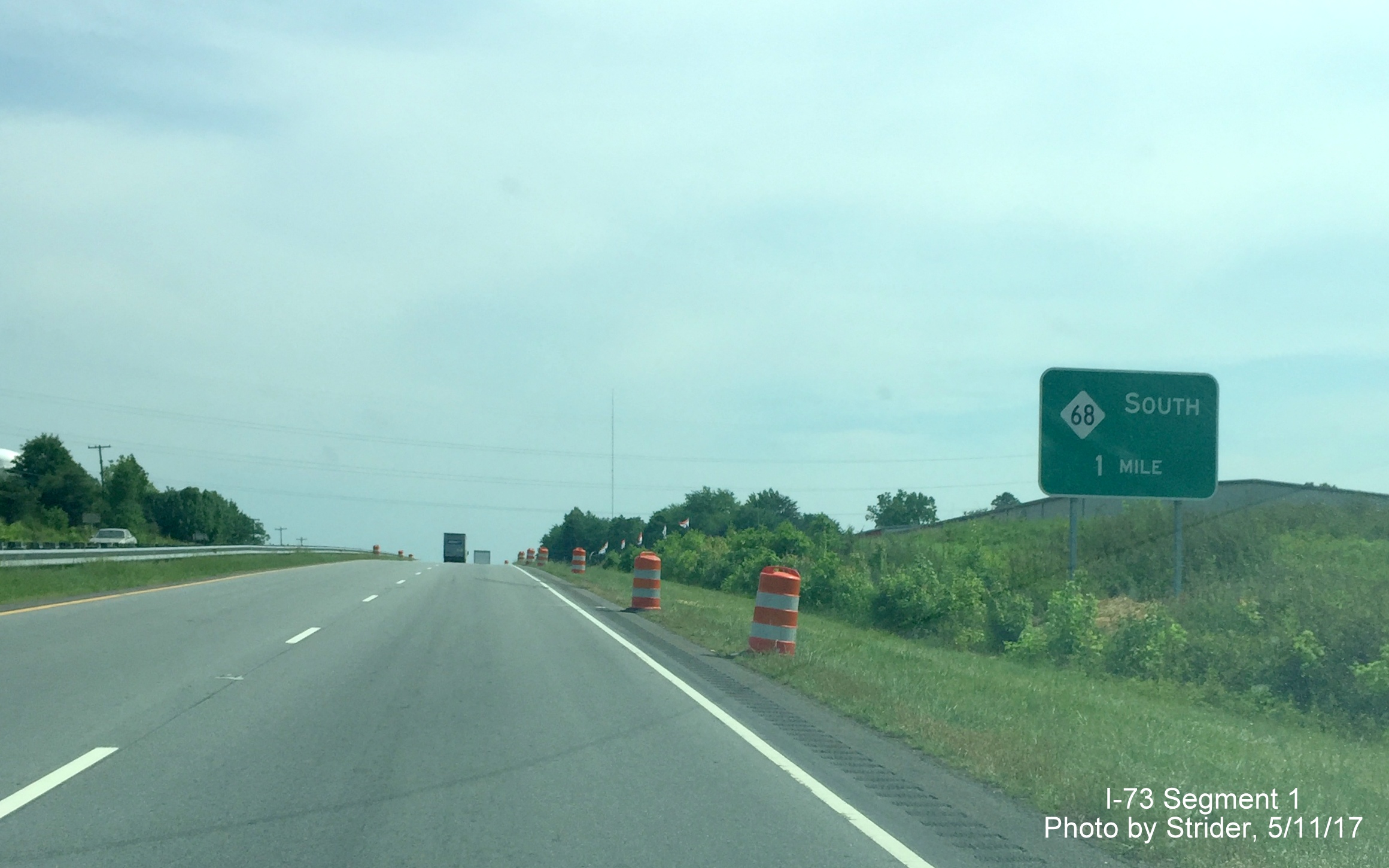 Image of newly placed 1-Mile Exit sign for new NC 68 interchange on US 220 South in Rockingham County, by Strider