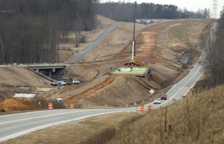 Image of progress widening US 220 to become I-73, Lyn Hay 
Greensboro News Record, 2/1/14