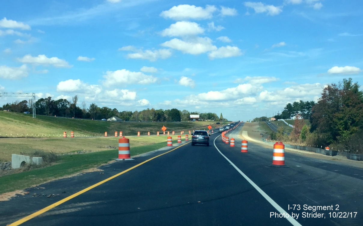 Image of Future end of I-73 North at NC 68 showing continued work needed on highway shoulders before 
          route can be completed, by Strider