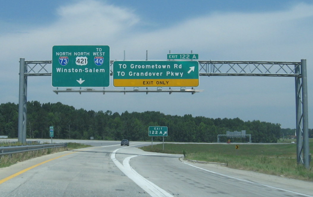 Photo of signage at merge between Greensboro Loop (US 421 North) and I-73 
North in June 2009