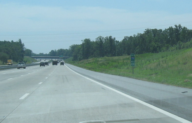 Photo of I-73 South milemarker 100 near site of future High Point Road 
exit, June 2009