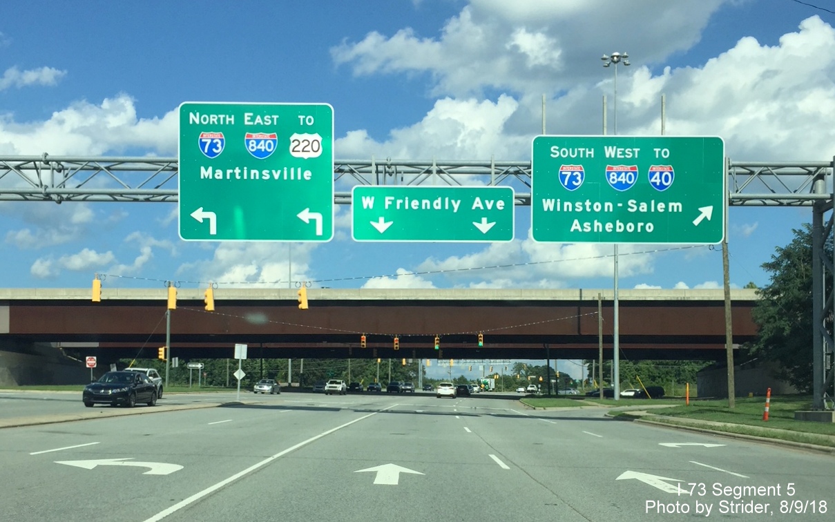 Image of new overhead signs at the ramps to I-73/I-840 Greensboro Loop heading east on W. Friendy Ave., by Strider