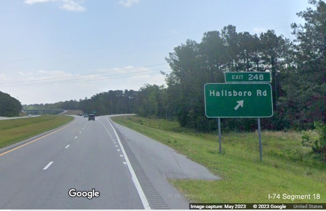 Image of ground mounted ramp sign for Hallsboro Road exit on US 74/76 East in Hallsboro, Google Maps Street View, May 2023