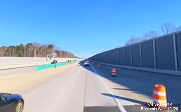 Image of noise walls on both sides of I-40 prior to the Union Cross Road exit in the
Winston-Salem Northern Beltway interchange project work zone, screen grab from Benjamin Wolf video, January 2026