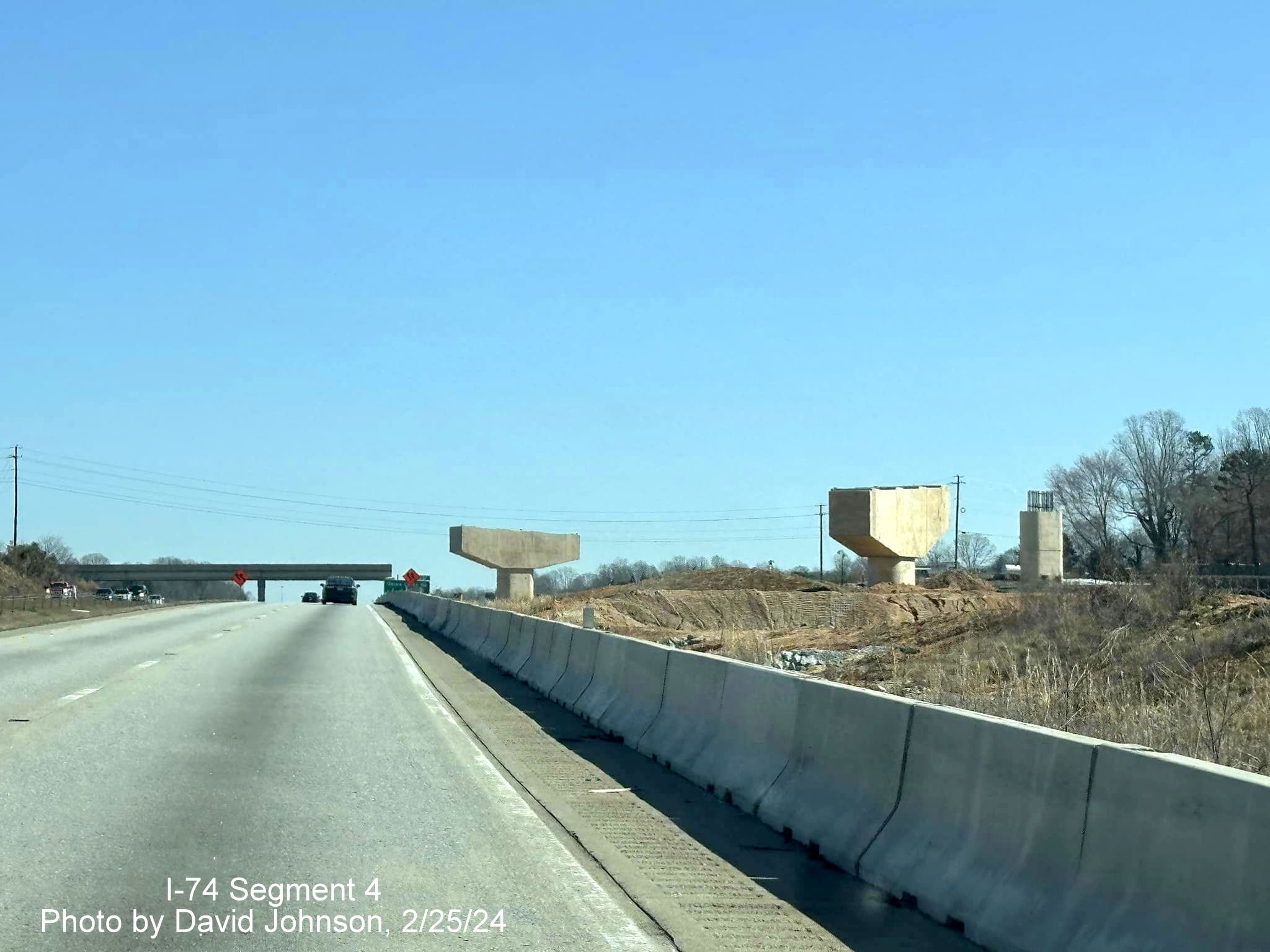 Image of flyover ramp supports awaiting further construction along I-40 East as part of 
        I-74/Winston-Salem Northern Beltway construction in Forsyth County, by David Johnson, February 2024