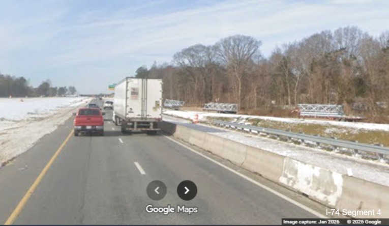 Image of overhead sign posts and supports along current I-74 West prior to the
Ridgewood Road exit as part of the Winston- Salem Northern Beltway interchange project, screen grab from Google Maps Street
View, January 2026