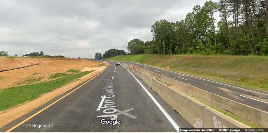Image of current US 52 North roadway paralleling future future I-74 Eastlanes as part of the 
        future Winston-Salem Northern Beltway interchange, Google Maps Street View, June 2023