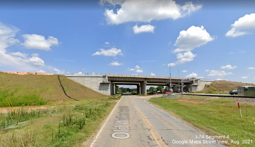 View of nearly completed bridge over Old Walkertown Road by future NC 74/Winston-Salem Northern 
        Beltway (I-74), Google Maps Street View image, August 2021