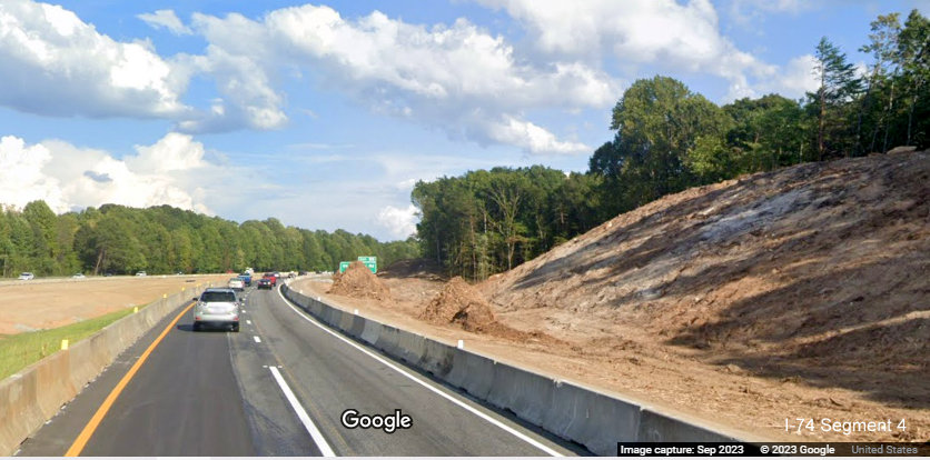 View of excavation along I-74 East lanes in Winston-Salem Northern Beltway 
       interchange work zone, Google Maps Street View, September 2023