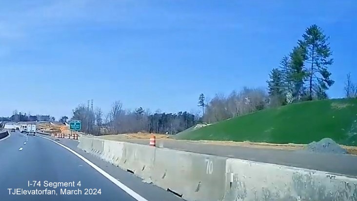Image of unpaved future ramp from US 52 (Future I-285) North to NC 74 (Future I-74) East 
       /Winston-Salem Northern Beltway, screen grab from TJElevatorfan video, March 2024