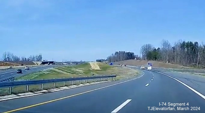 Image of US 52 (Future I-285) North approaching current ramp from NC 74 (Future I-74) 
       East/Winston-Salem Northern Beltway, screen grab from TJElevatorfan video, March 2024