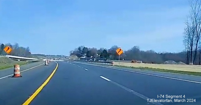 Image of current NC 74 (Future I-74) East/Winston-Salem Northern Beltway lanes approaching
       the Grassy Creek bridge, screen grab from TJElevatorfan video, March 2024