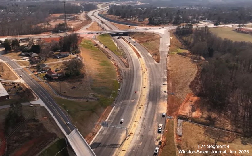 Image over Beltway flyover ramps under construction at Kernersville Road as part
of the I-74 Winston-Salem Northern Beltway interchange project, screen grab from Winston-Salem Journal video, January 2026