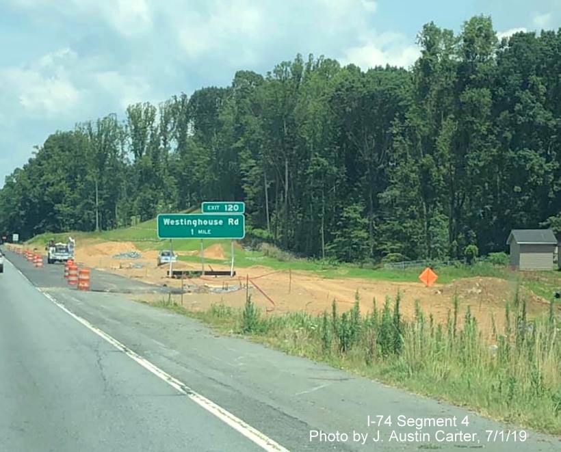 Image of construction of ramps for future I-74/Winston-Salem Beltway interchange with US 52 North before Westinghouse Road interchange, by J. Austin Carter
