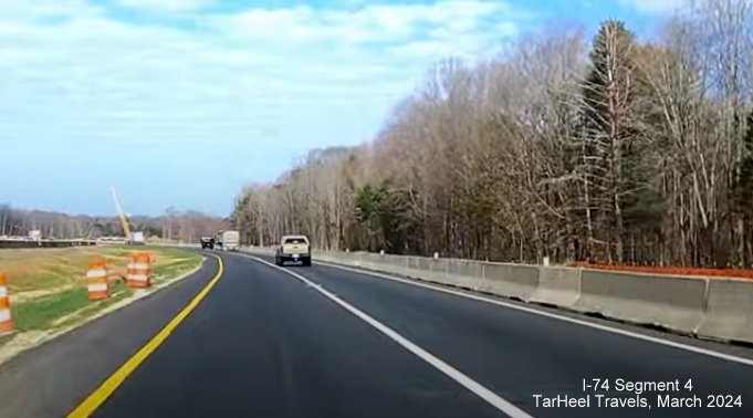 Image of I-74 West entering Winston-Salem Northern Beltway interchange construction area, from 
        video by TarHeel Travels, March 2024