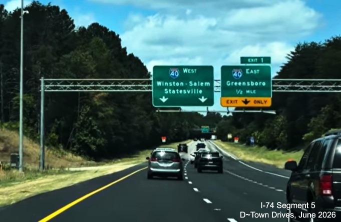 Image of overhead signage for the I-40 exits with new exit number for the I-40
East ramp, D~Town Drives, June 2026