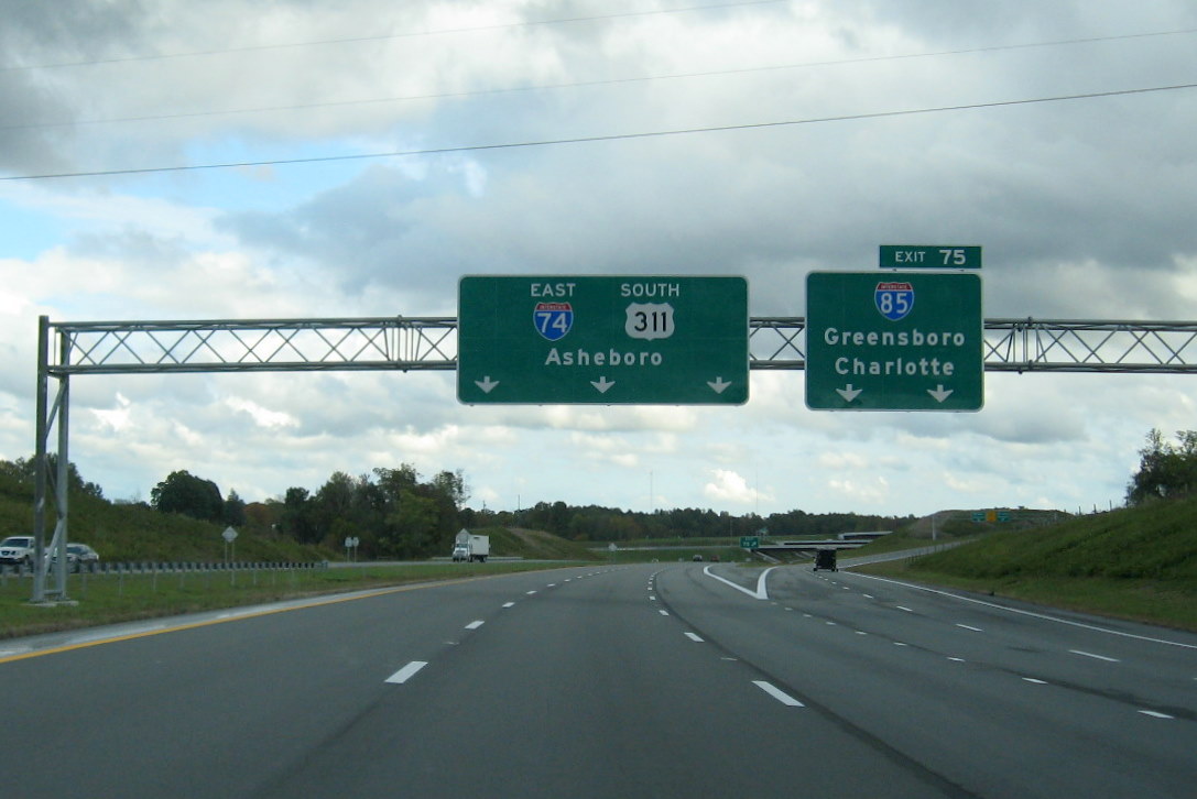 Photo of overhead exit signage at the I-74 East interchange with I-85 in Oct. 
2011