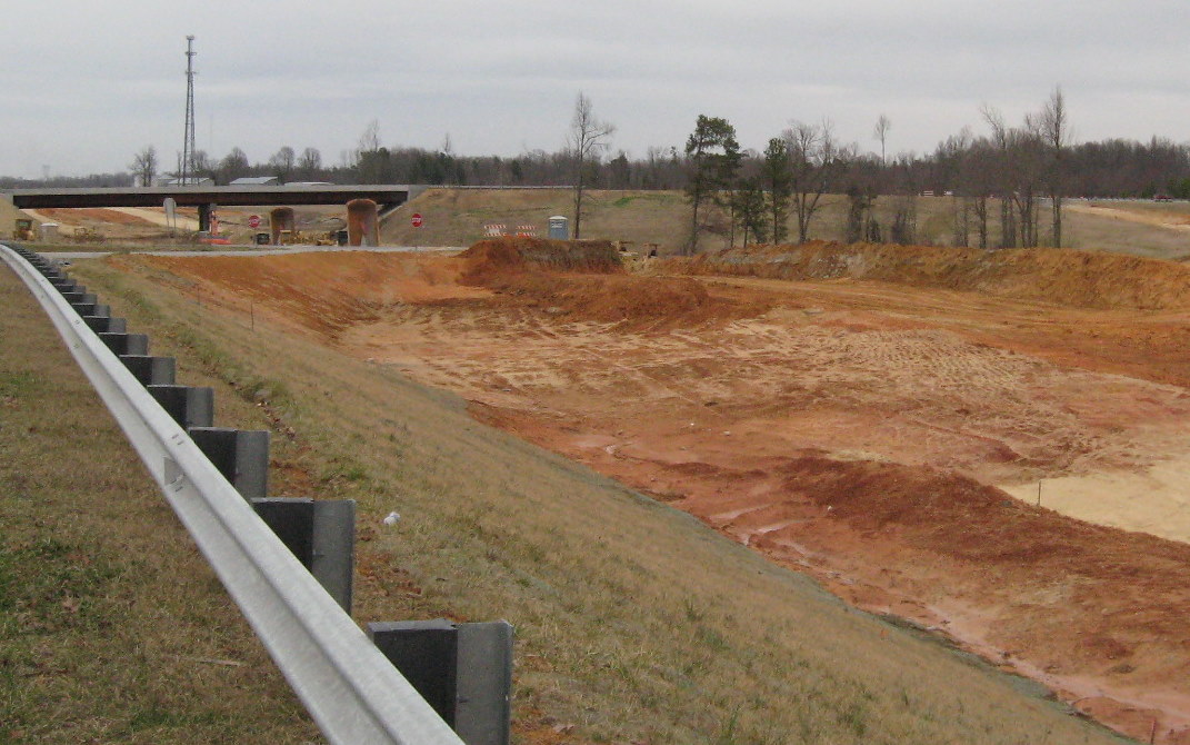 Photo showing progress in removing the old alignment of Cedar Square Road to 
make way for the I-74 freeway, March 2010