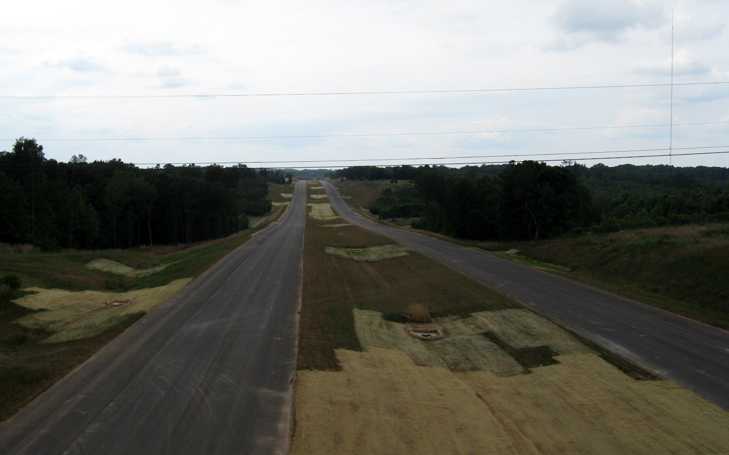 Photo of view north from the Heath Dairy Road Bridge showing the progress in 
constructing the future I-74 freeway near Randleman, June 2012