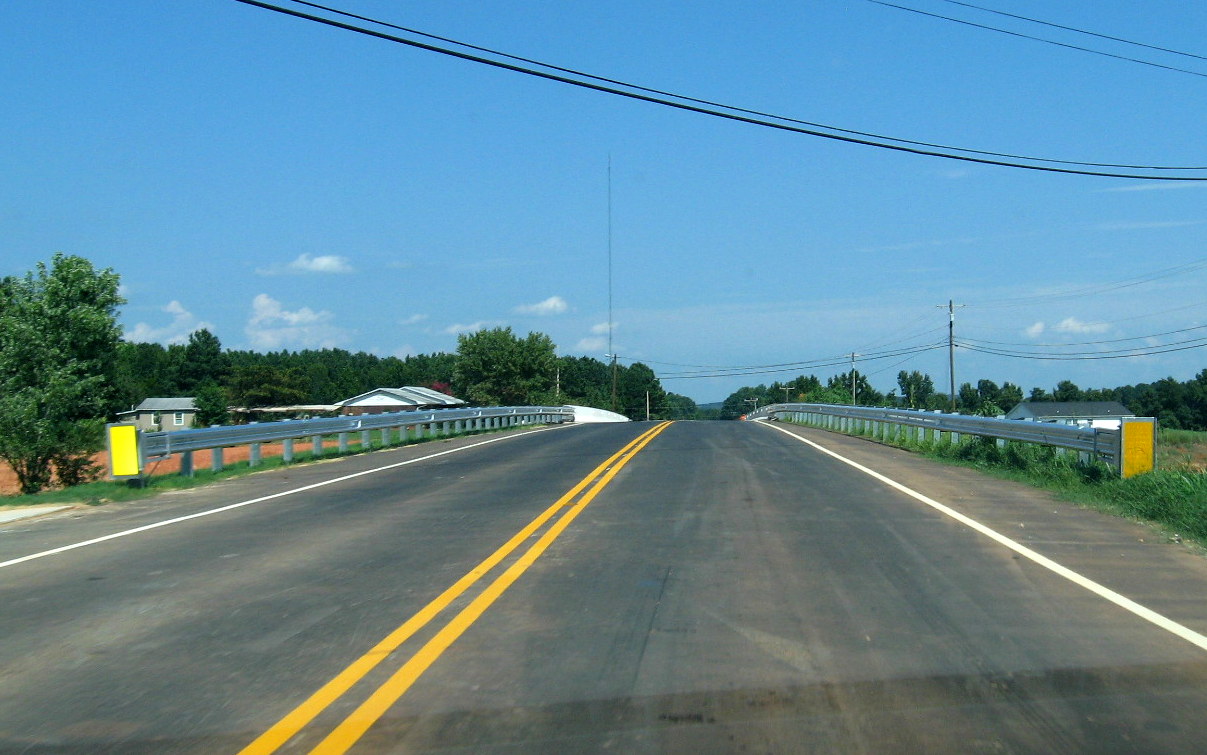Photo of view from driving over newly completed Walker Mill Rd Bridge over 
future I-74 freeway in July 2012