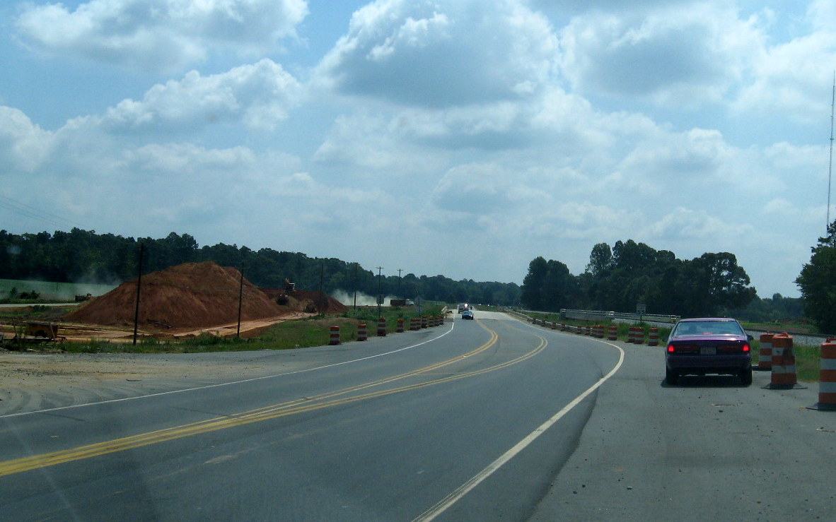 Photo showing construction in area of completed US 311 bridge at future I-74 
freeway in Sophia, Aug. 2012