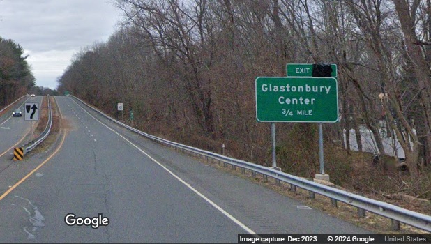 Image of 1 mile advance sign with new milepost based exit number covered up on CT 17 South in 
      Glastonbury, Google Maps Street View, December 2023