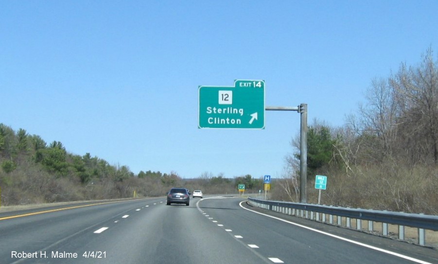 Image of overhead ramp sign for MA 12 exit with new milepost based exit number on I-190 North in Sterling, April 2021