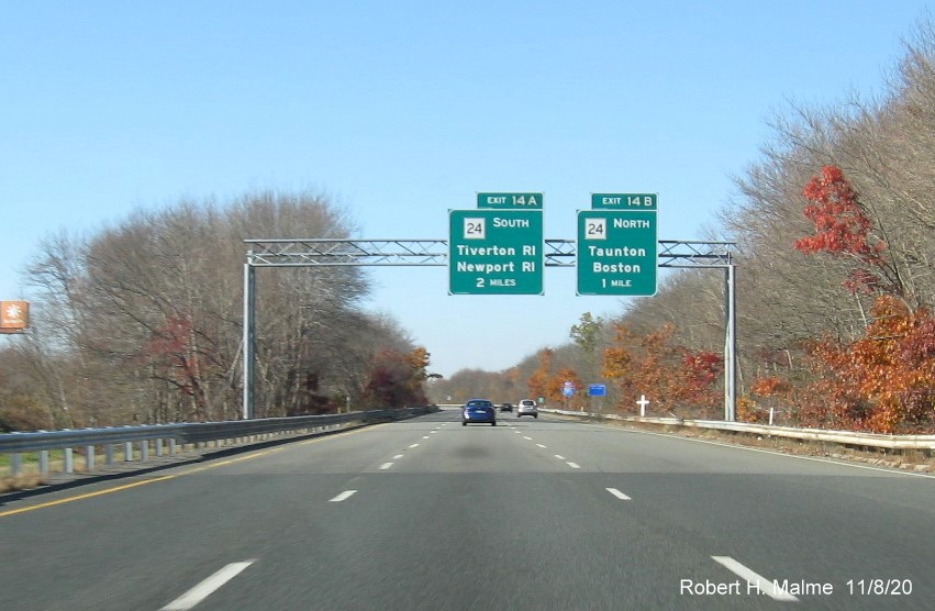 Image of overhead advance signs for MA 24 South and North exits with new milepost based exit numbers on I-195 West in Fall River, November 2020