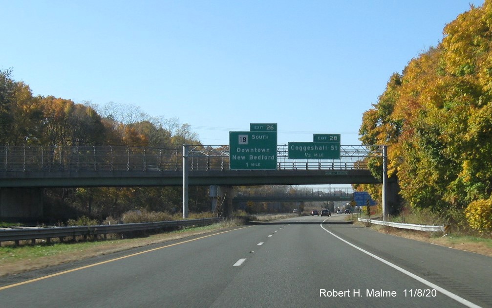 Image of overhead signs at the ramp to Coggeshall Street exit with new milepost based exit numbers on I-195 West in New Bedford, November 2020