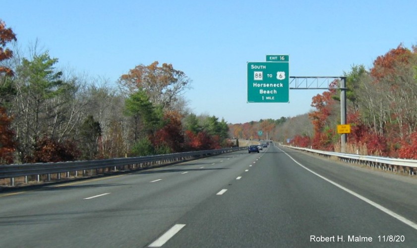 Image of 1-mile advance overhead sign for MA 88 South exit with new milepost based exit number and yellow old exit number sign on support post on I-195 West in Westport, November 2020