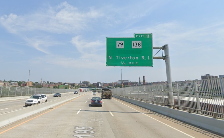 Google Maps Street View image of 1/4 mile advance sign for MA 79/138 exit with new milepost based exit number on I-195 East in Fall River, July 2021