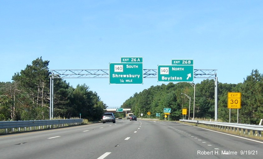 Image of overhead signage at ramp for MA 140 North exit with new milepost based exit numbers on I-290 West in Shrewsbury, September 2021