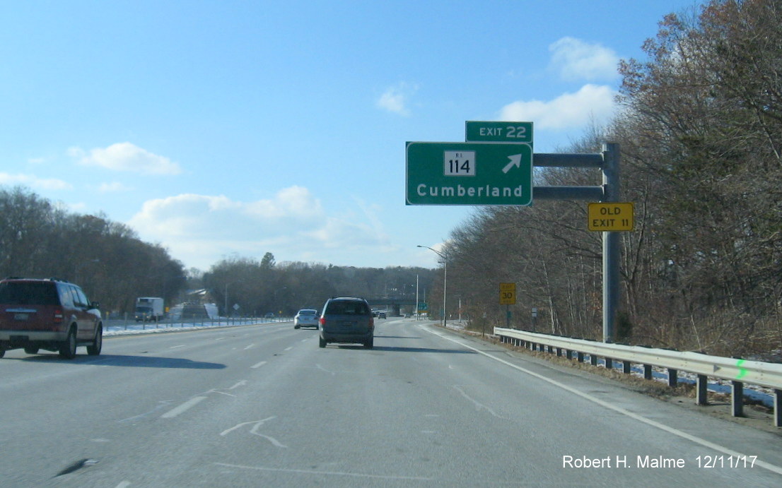 Image of RI 114 overhead exit sign on I-295 South in Cumberland with new exit number