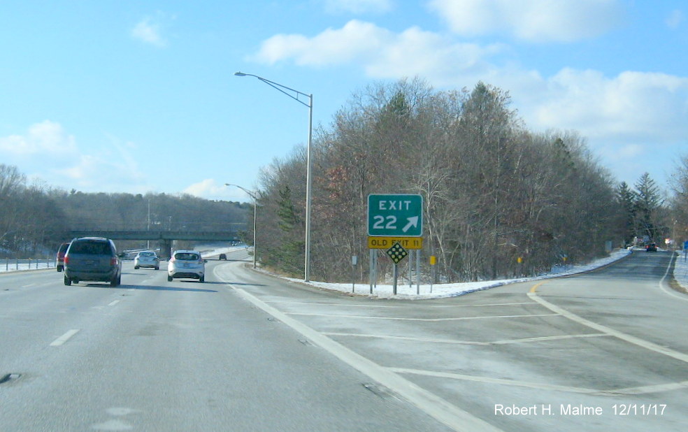 Image of new gore sign for RI 114 exit on I-295 South in Cumberland with new exit number and temporary yellow old exit number tab