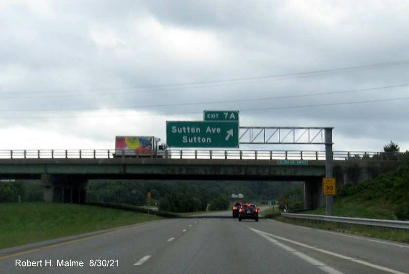 Image of overhead exit sign for second Sutton Avenue exit with new milepost based exit number I-395 South in Oxford, August 2021 