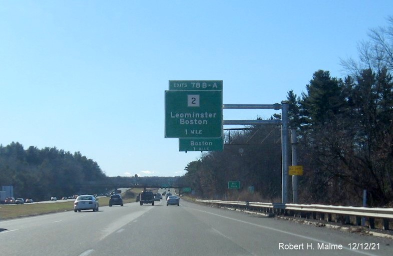 Image of newly placed 1 mile advance overhead sign prior to old sign for MA 2 exit on I-495 South in Littleton, December 2021