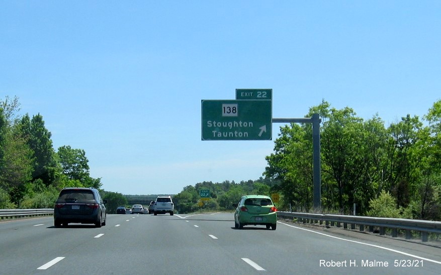 Image of overhead ramp sign for MA 138 exit with new milepost based exit number on I-495 South in Taunton, May 2021