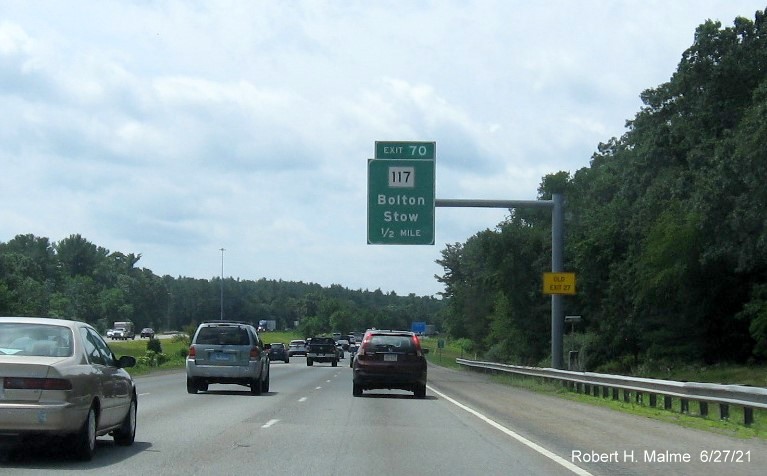 Image of 1/2 mile advance overhead sign for MA 117 exit with new milepost based exit number on I-495 South in Bolton, June 2021