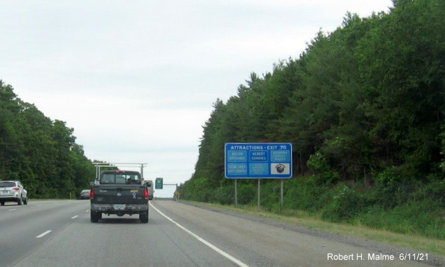 Image of auxiliary sign for MA 117 exit with new milepost based exit number on I-495 North in Bolton, June 2021