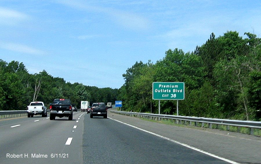 Image of auxiliary sign for MA 1A exit with new milepost based exit number on I-495 North in Wrentham, June 2021