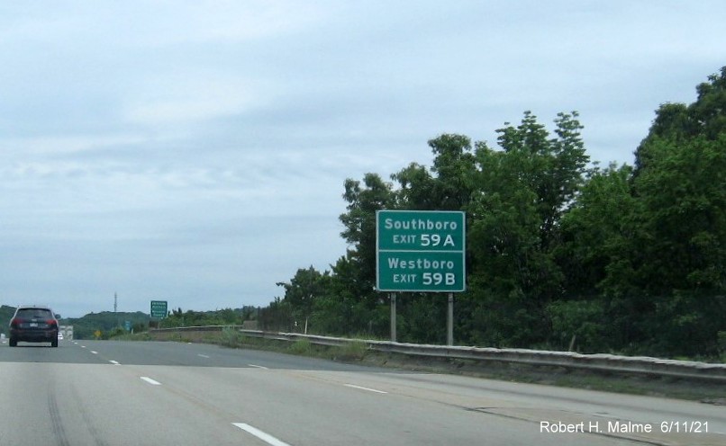 Image of auxiliary sign for MA 9 exits with new milepost based exit numbers on I-495 North in Hopkinton, June 2021